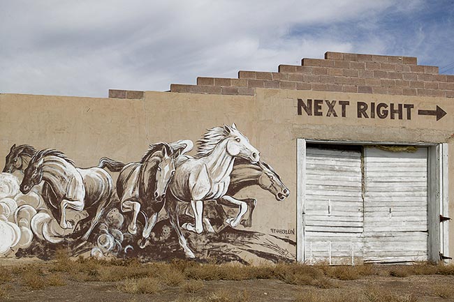 [© Next Right by Judy Hill is described with Colorado, Mural, Horse, Horses, Rural, Town, 2005, Spring, Summer, Autumn, Fall, Buildings, Old Buildings, Wall, Brown, Blue, White, Beige, Black, Neutrals, Warm, Air, Blue sky, Clouds, Door, Old things, Paint, Farm, Farms, Horizontal, Antonito, Stock, Desert hit 6721 rate ]