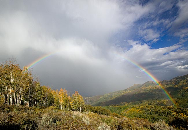[© Pot O Gold by Judy Hill is described with Color, Woods, Stock, Old Snowmass, White River National Forest, Fine Art, Rocky Mountains, Colorado, Horizontal, Warm, Cool, Blue, Brown, Yellows, White, Beige, Green, Elk Range, Air, Blue sky, Clouds, Sagebrush, Bush, Brush, Tree, Alpine, Forest, 2006, Fall, Aspens, Trees, Roaring Fork Valley, Rockys, Rainbows, Fine Art hit 21099 rate ]